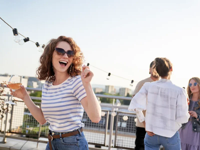 young-caucasian-woman-dancing-at-the-rooftop-party-2023-11-27-05-17-03-utc
